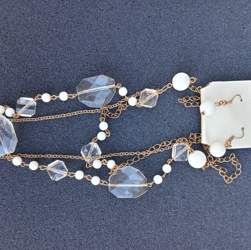 Brand new gold tone necklace with earrings set